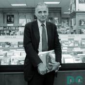 Ralph Nader stands in Olssson's 'Popular Section.'