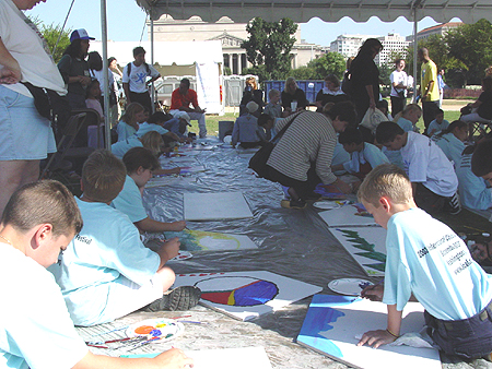 ICAF Young Artists painting individual panels for George Rodrigue Art for Peace Pyramid, September 11, 2003