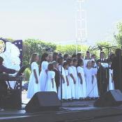 World Childrens Choir with director Sondra Harnes perform on the World Stage, September 11, 2003