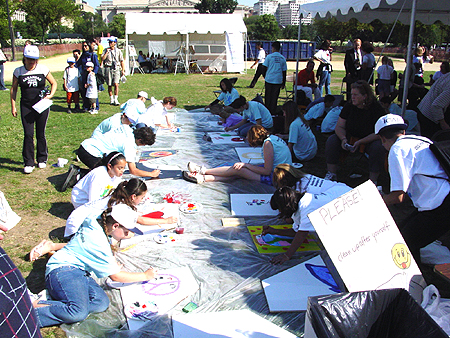 ICAF Young artists painting individual panels for George Rodrigue Art for Peace Pyramid, September 11, 2003