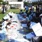 ICAF Young artists painting individual panels for George Rodrigue Art for Peace Pyramid, September 11, 2003