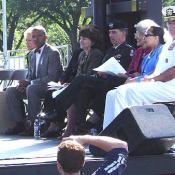 VIPs on World Stage, from left to right: Mayor Williams, General Consumano, Harriet Fulbright, Admiral Moore