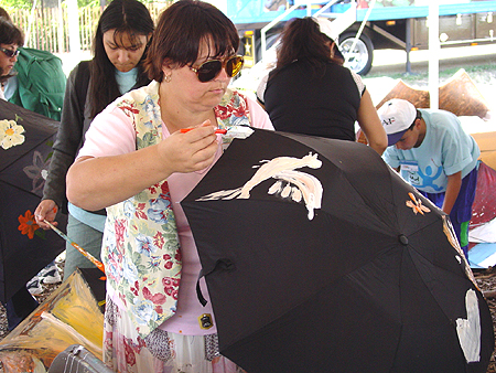 Peace parasols painting in Public Assemblys arts and crafts activity, September 11, 2003