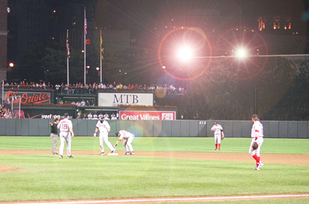 The Red Sox take the field to warm-up before the start of another inning.  