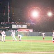 The Red Sox take the field to warm-up before the start of another inning.  