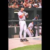 A Boston Red Sox player waits his turn at bat.