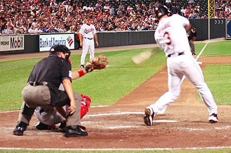Bigbie's warm-up pays off when he connects with the ball to get the O's on base.