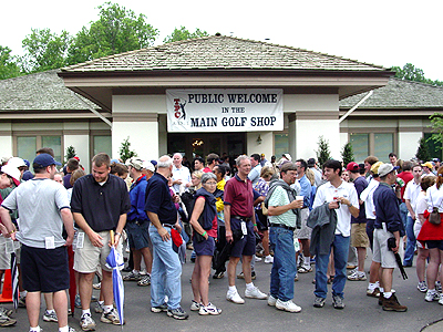 Crowds check out all the merchandise at the onsite golf shop