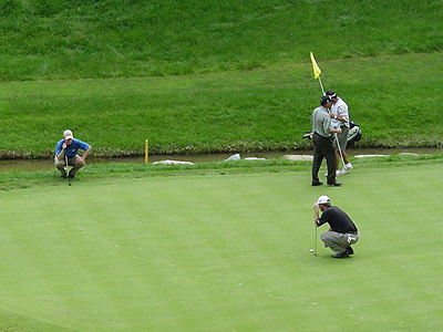 A Pro getting down low to make sure of his next shot