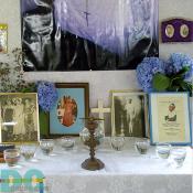 A traditional altar that honors the family members that have passed on is located in the house of every Haitian family.