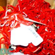 A close up of the red yarn offerings used in Haitian religious ceremonies.